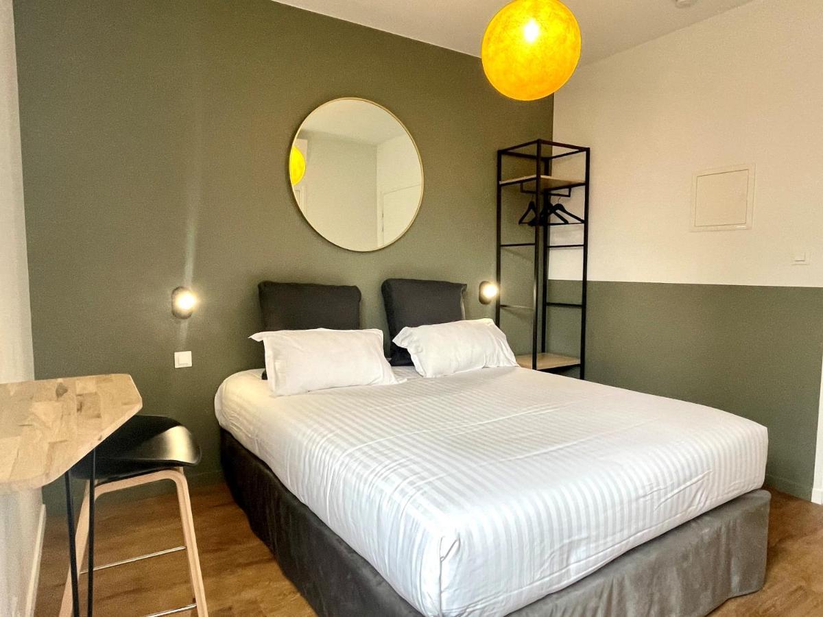Апартаменты Demeure Rossini Cholet Centre Номер фото